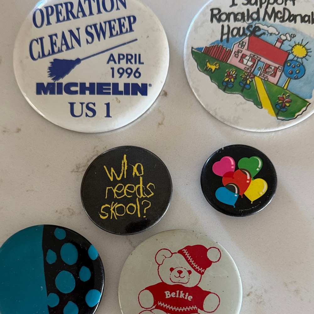 Vintage Michelin and variety Button Pin Collection